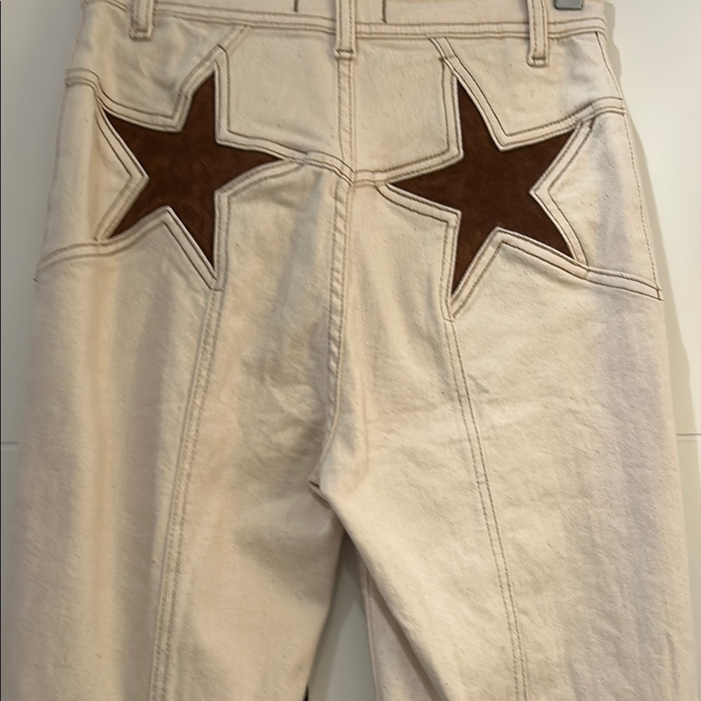 We The Free Cream Jeans with Brown Star Accents